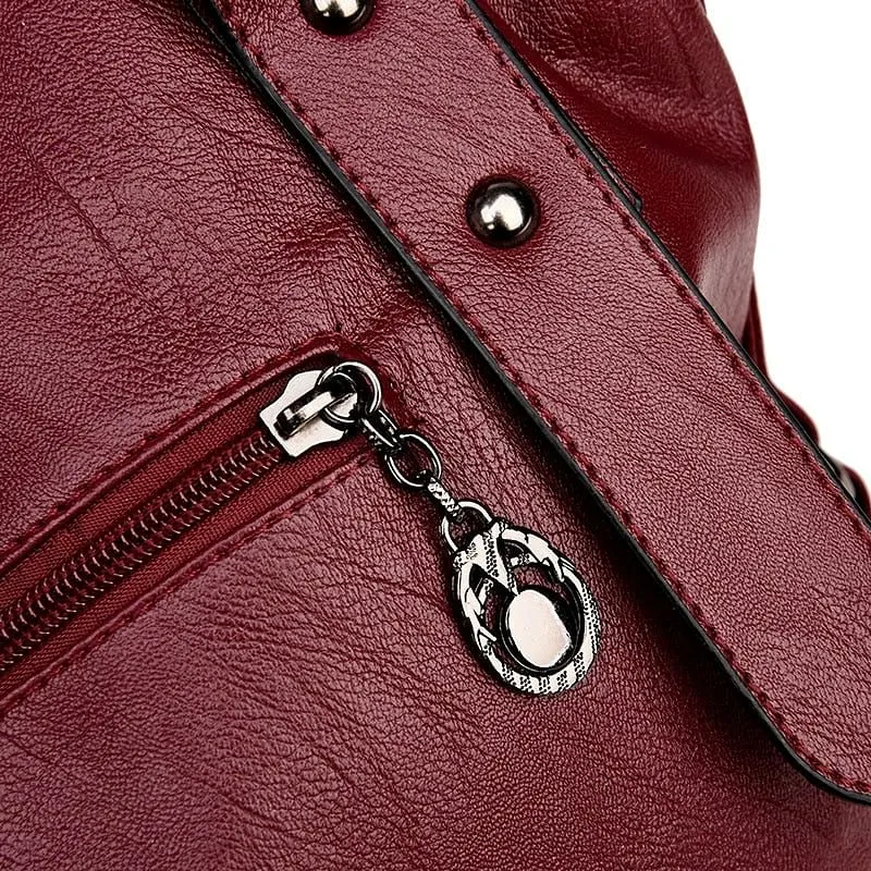 Elegant Burgundy Leather Handbag with Silver Accents