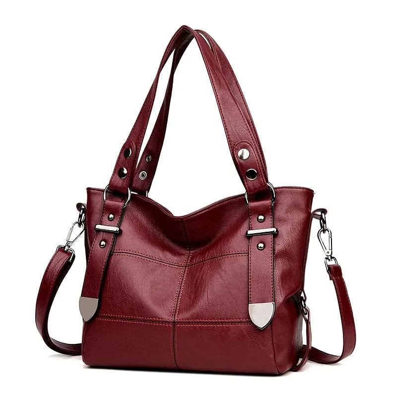 Elegant Burgundy Leather Handbag with Silver Accents