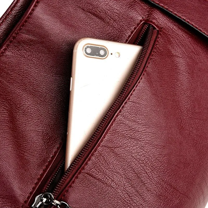 Elegant Burgundy Leather Handbag with Silver Accents